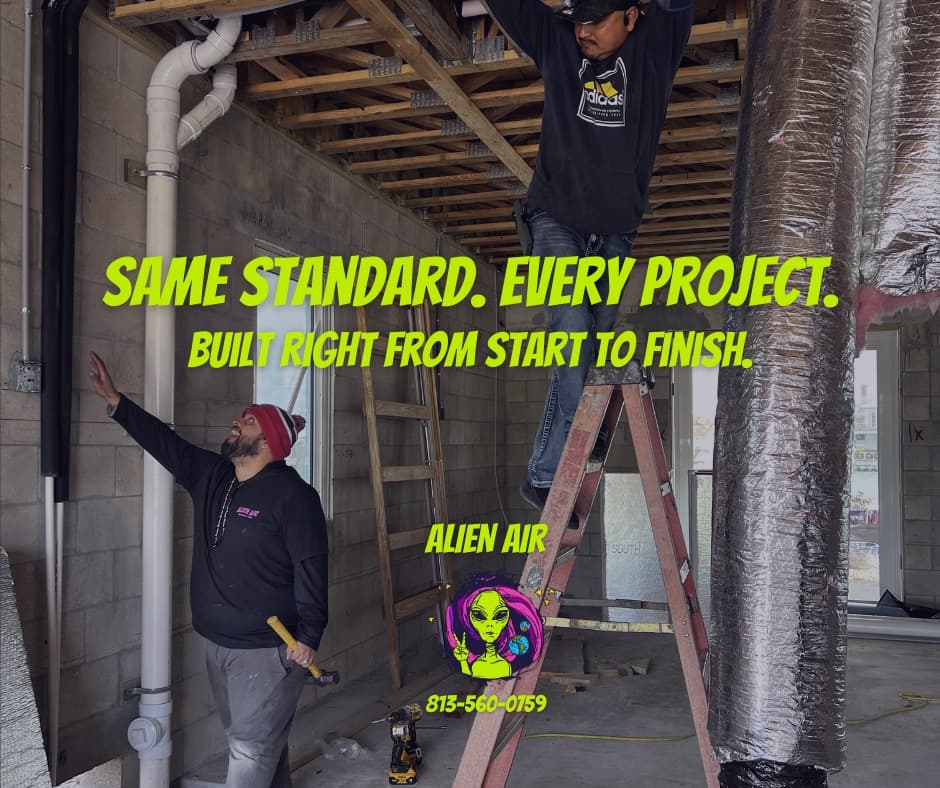 Alien Air technicians installing ductwork on a new construction site